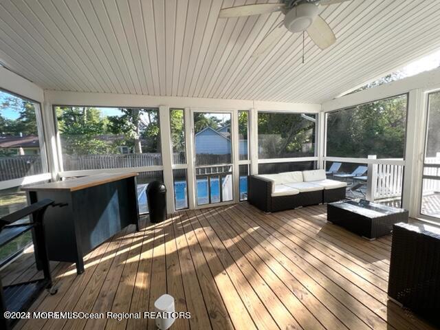 742 Myrtle Avenue West Allenhurst, NJ 07711 - Photo 12 of 13 a bedroom with furniture and large windows