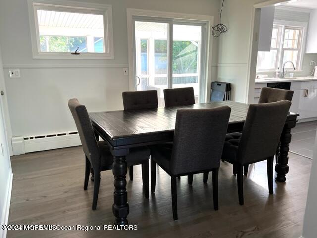 742 Myrtle Avenue West Allenhurst, NJ 07711 - Photo 9 of 13 a view of a dining room with furniture and wooden floor