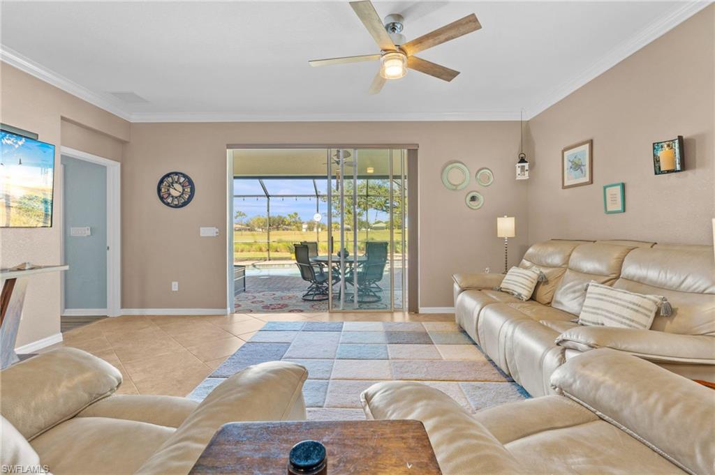3147 Walnut Grove Lane Alva, FL 33920 - Photo 16 of 45 a living room with furniture and a large window