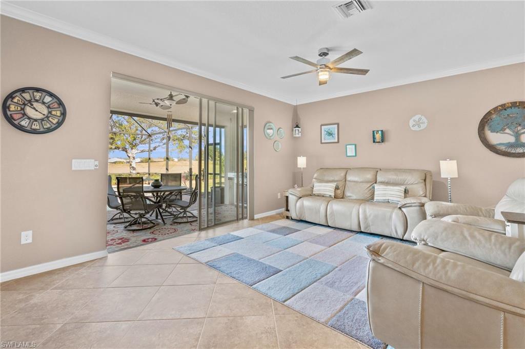 3147 Walnut Grove Lane Alva, FL 33920 - Photo 20 of 45 a living room with furniture and a large window