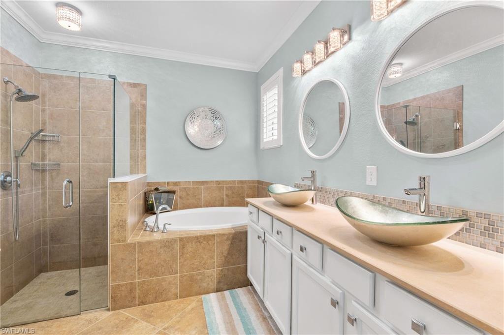 3147 Walnut Grove Lane Alva, FL 33920 - Photo 24 of 45 a bathroom with a double vanity sink and a mirror