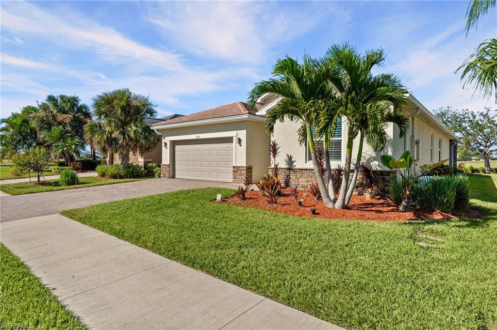 3147 Walnut Grove Lane Alva, FL 33920 - Photo 3 of 45 a view of a backyard with a sitting area