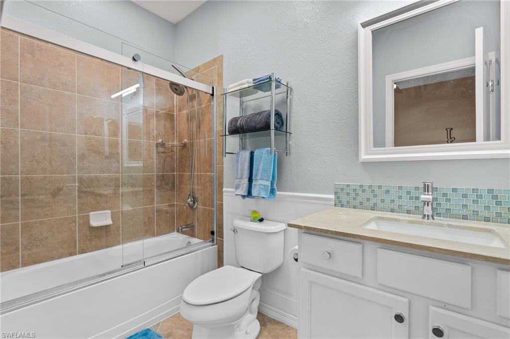 3147 Walnut Grove Lane Alva, FL 33920 - Photo 31 of 45 a bathroom with a sink a toilet and shower