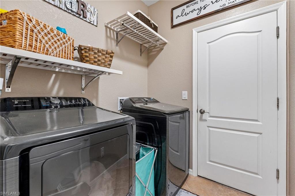 3147 Walnut Grove Lane Alva, FL 33920 - Photo 32 of 45 a close view of washer and dryer