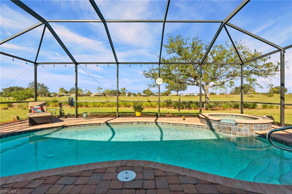3147 Walnut Grove Lane Alva, FL 33920 - Photo 36 of 45 a view of a swimming pool