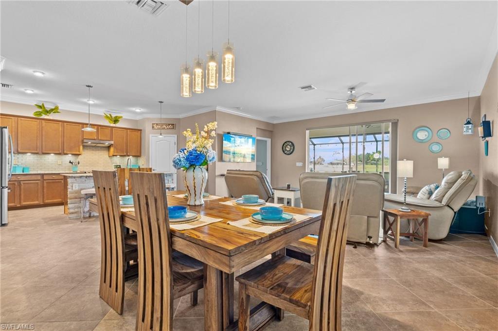 3147 Walnut Grove Lane Alva, FL 33920 - Photo 6 of 45 a view of a dining room with furniture