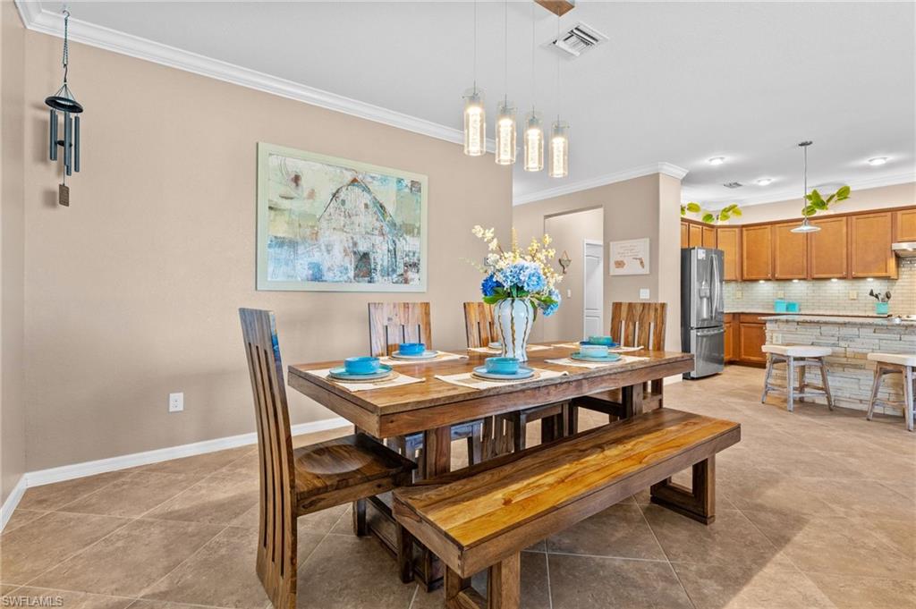 3147 Walnut Grove Lane Alva, FL 33920 - Photo 7 of 45 a outdoor dining space with furniture and outdoor view