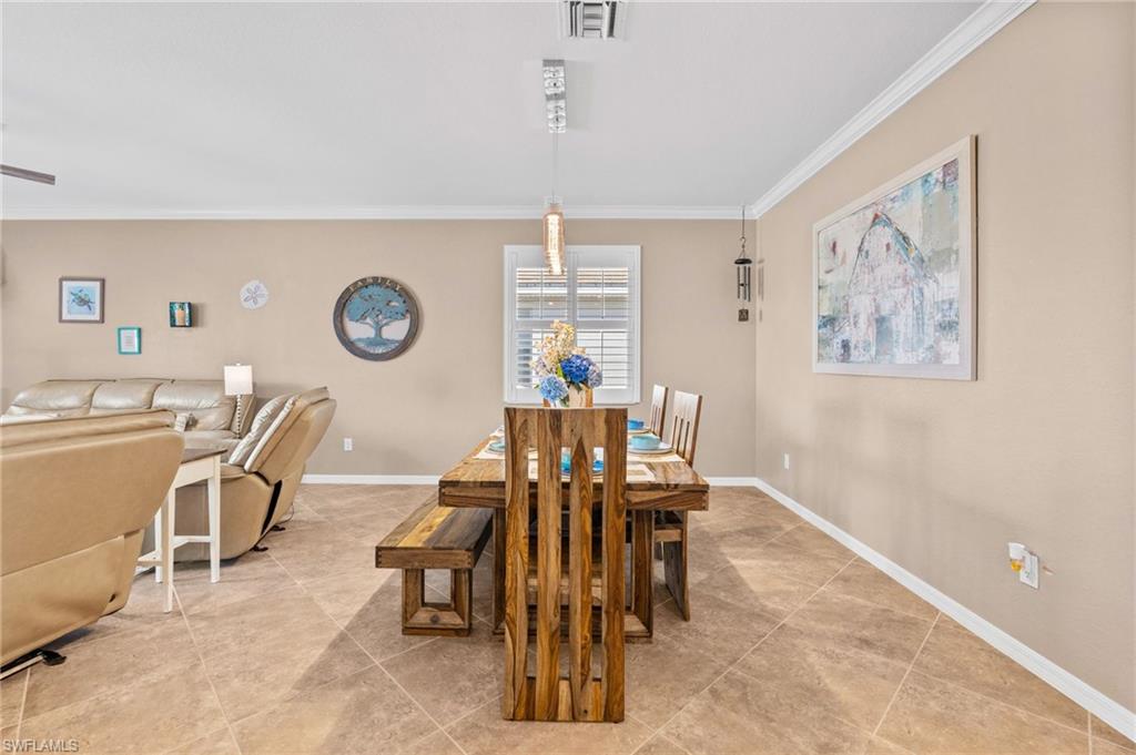 3147 Walnut Grove Lane Alva, FL 33920 - Photo 8 of 45 a dining room with furniture and window