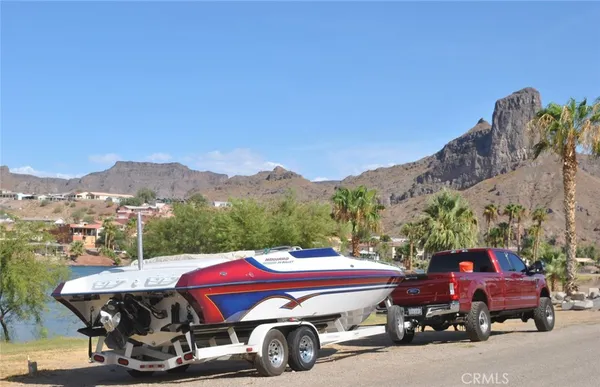 a view of a terrace with a table and chairs