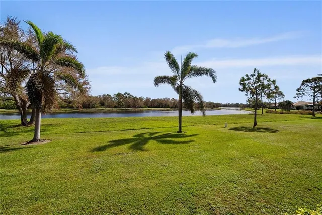 an aerial view of residential house with outdoor space and parking