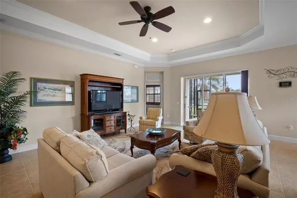 a kitchen with kitchen island granite countertop wooden cabinets and stainless steel appliances