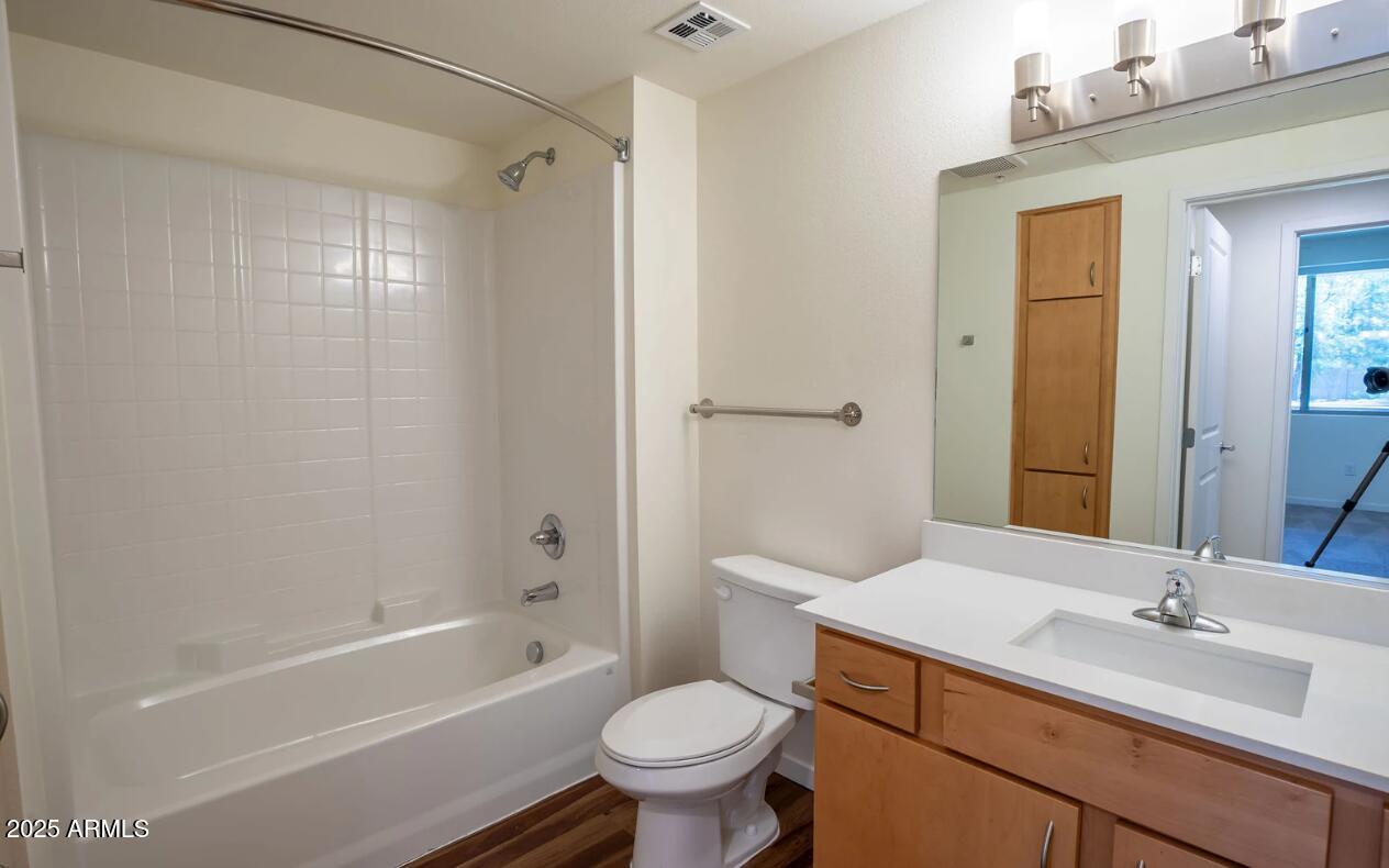 2050 West Southern Avenue, Unit 2 Phoenix, AZ 85041 - Photo 7 of 15 a bathroom with a sink toilet and shower