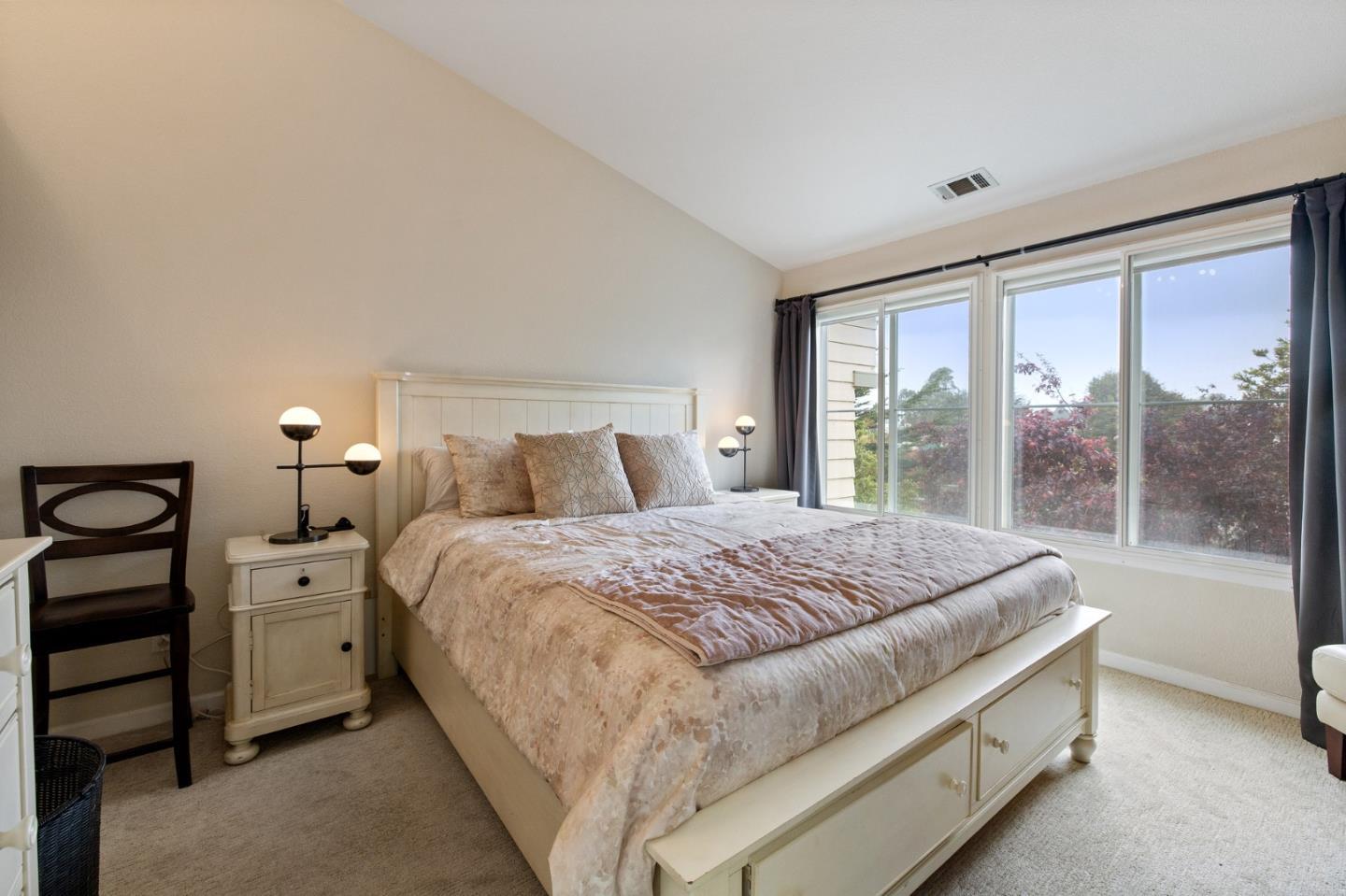 6 Patrick Way Half Moon Bay, CA 94019 - Photo 15 of 28 a bed room with a bed and a night stand