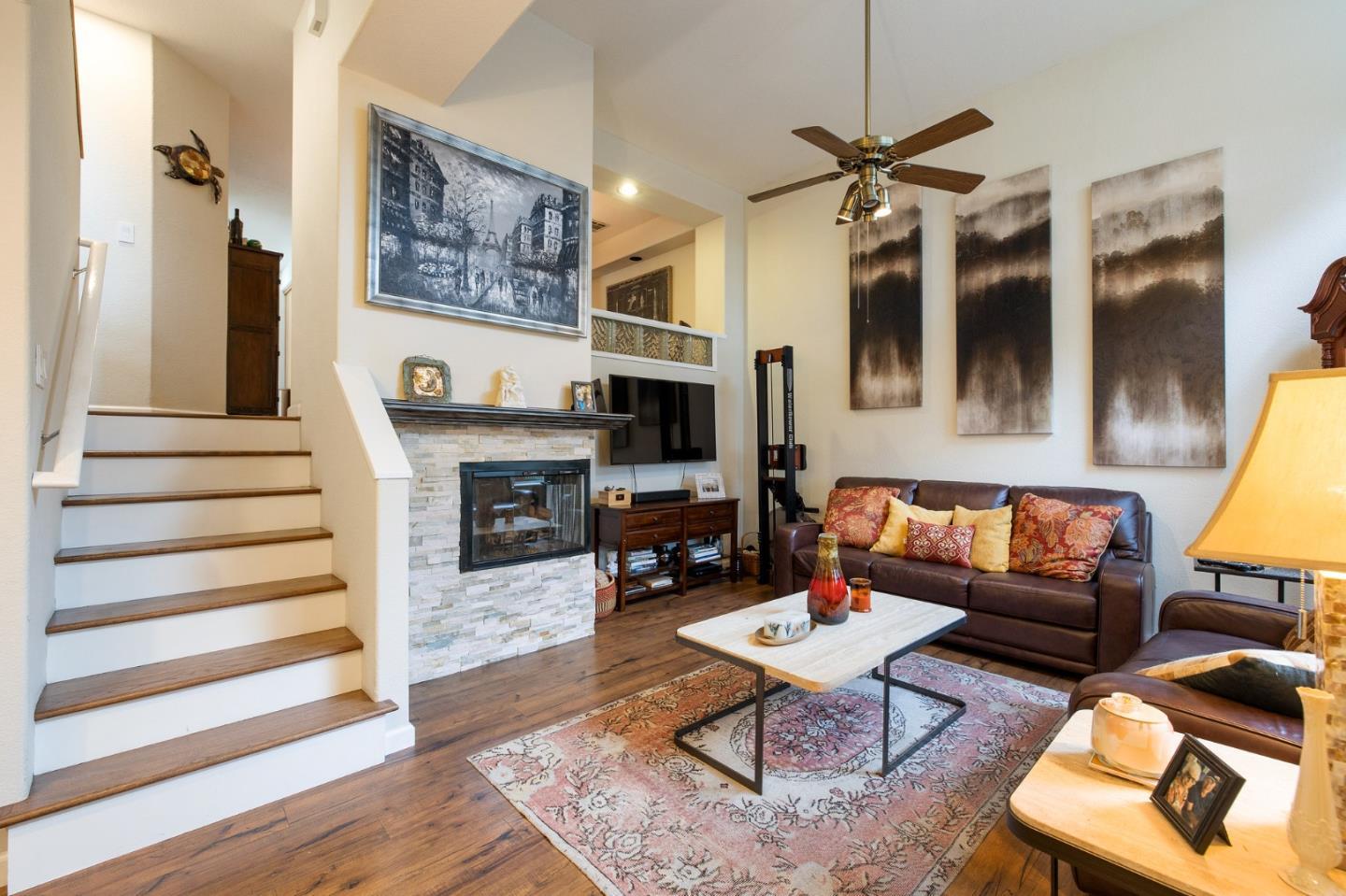 6 Patrick Way Half Moon Bay, CA 94019 - Photo 2 of 28 a living room with furniture and a fireplace