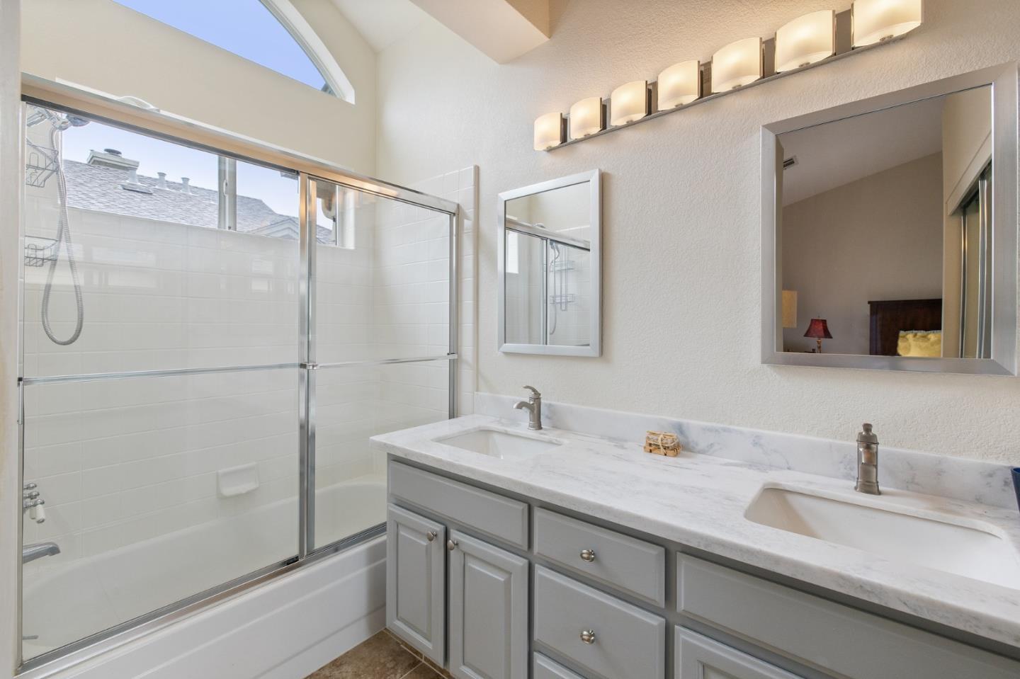 6 Patrick Way Half Moon Bay, CA 94019 - Photo 21 of 28 a bathroom with a double vanity sink mirror and shower
