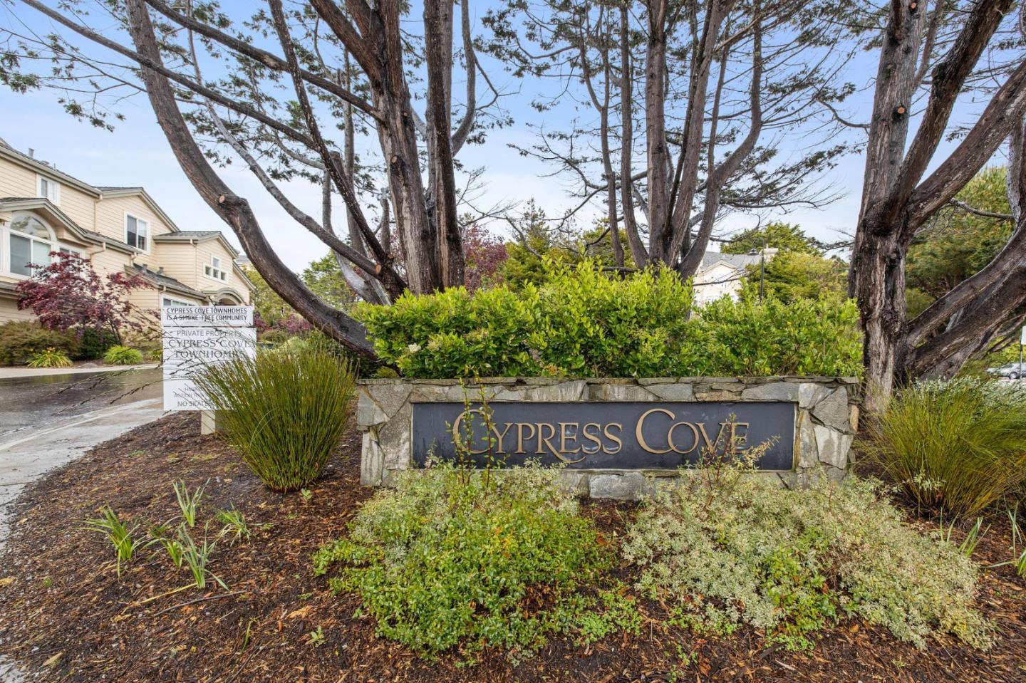 6 Patrick Way Half Moon Bay, CA 94019 - Photo 24 of 28 a sign that is sitting in front of flowers