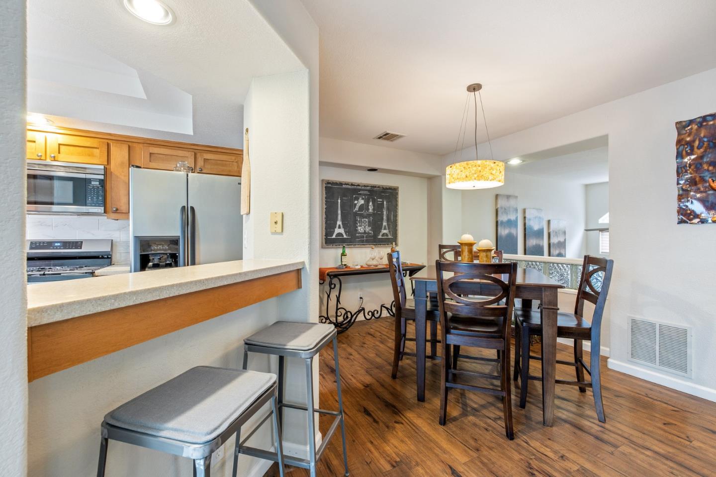 6 Patrick Way Half Moon Bay, CA 94019 - Photo 9 of 28 a view of a dining room with furniture window and wooden floor