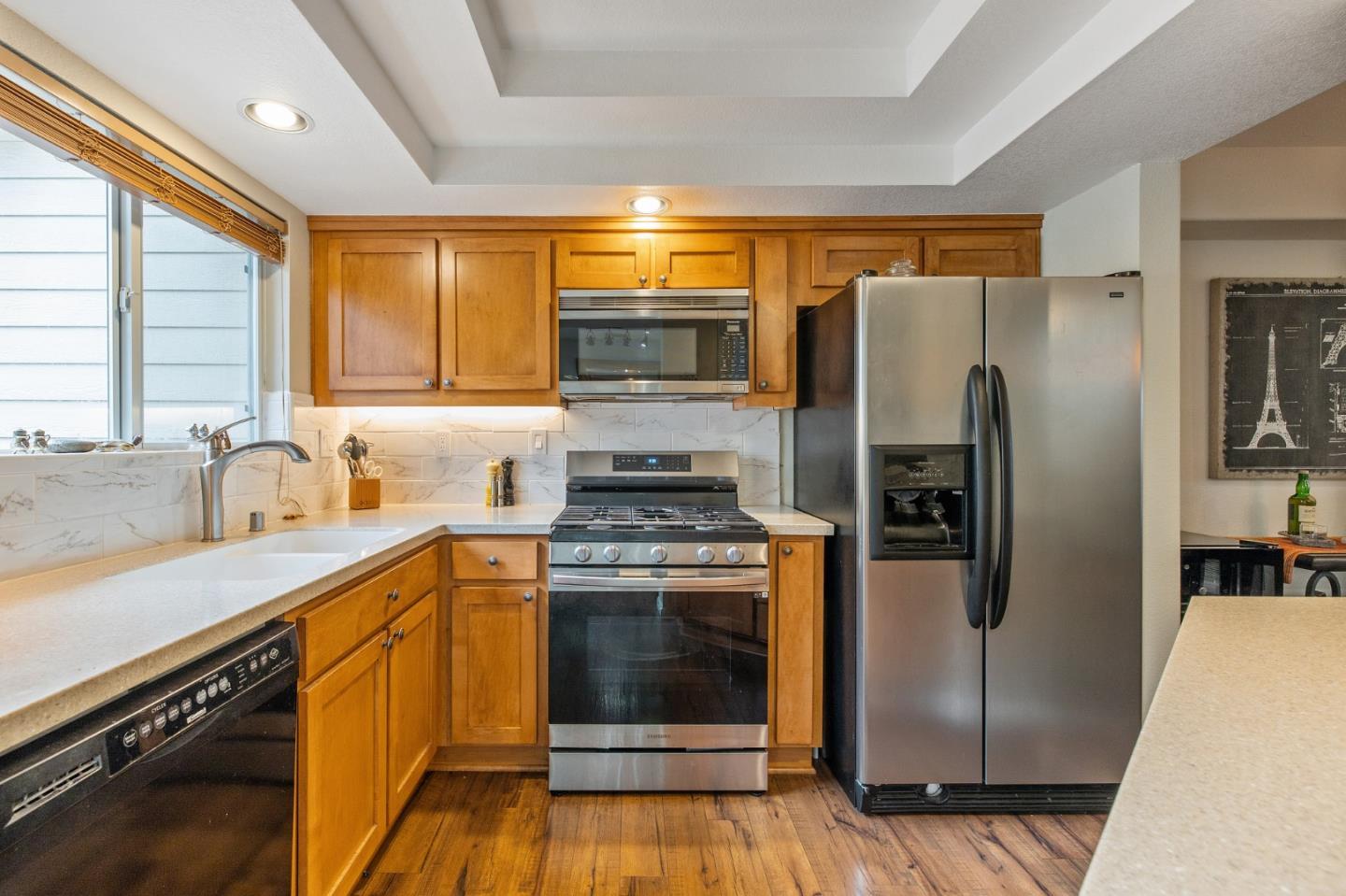 6 Patrick Way Half Moon Bay, CA 94019 - Photo 10 of 28 a kitchen with stainless steel appliances granite countertop a refrigerator a sink and a stove
