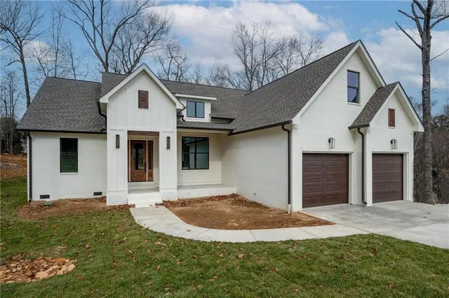 a view of backyard with green space