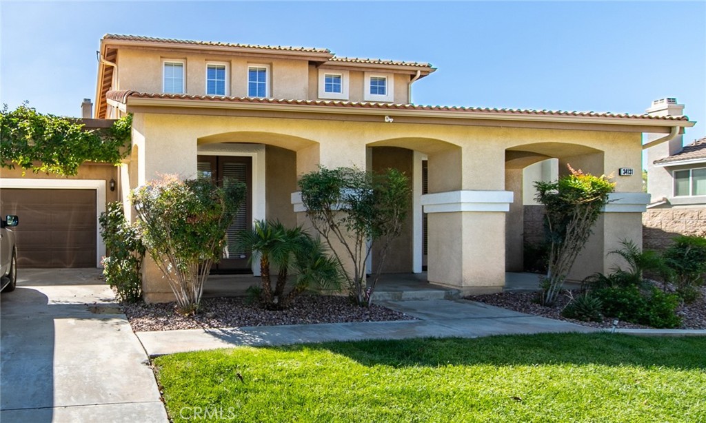34131 Pinehurst Drive Yucaipa, CA 92399 - Photo 1 of 1 a front view of a house with garden