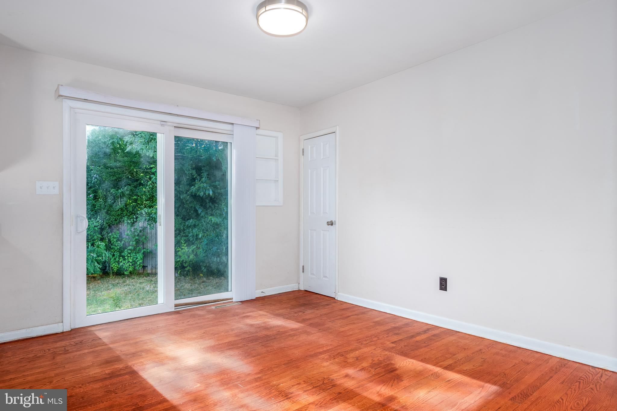 353 David Hall Road Dover, DE 19904 - Photo 4 of 16 Dining Room with Sliders To Back Yard