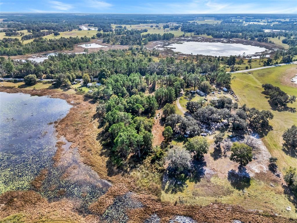 Youth Camp Road Groveland, FL 34736 - Photo 10 of 14 an aerial view of residential houses with outdoor space