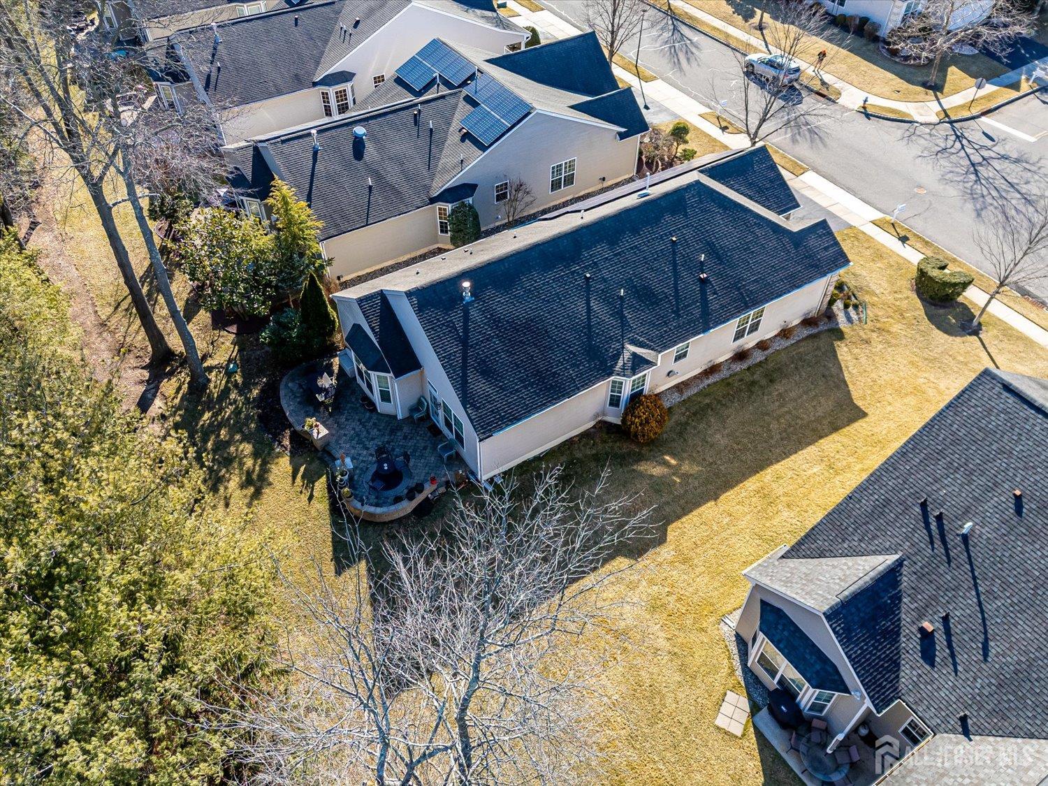 22 Silver Charm Road Manalapan, NJ 07726 - Photo 38 of 51 an aerial view of a house with a yard
