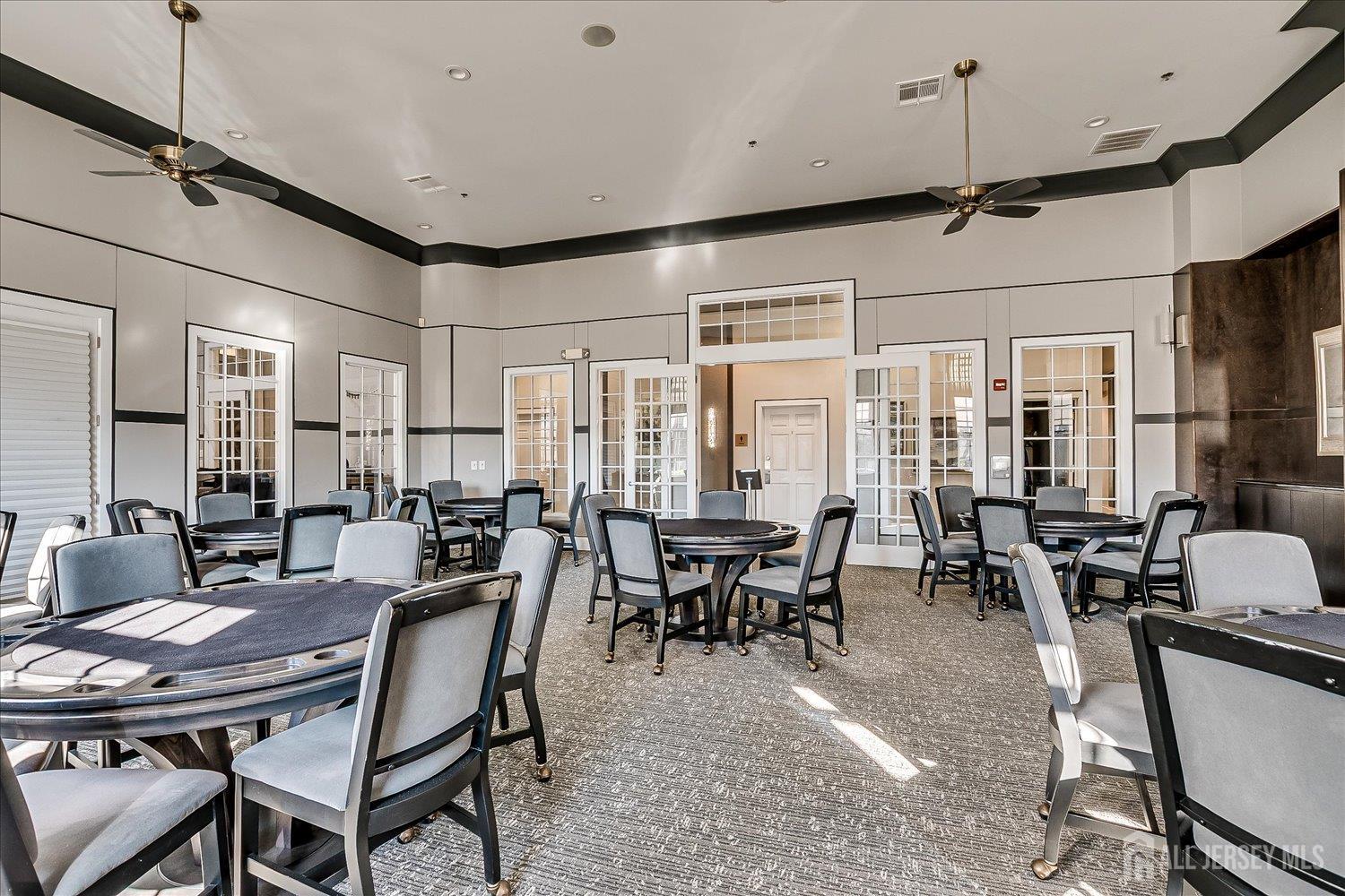 22 Silver Charm Road Manalapan, NJ 07726 - Photo 49 of 51 a view of a dining room with furniture