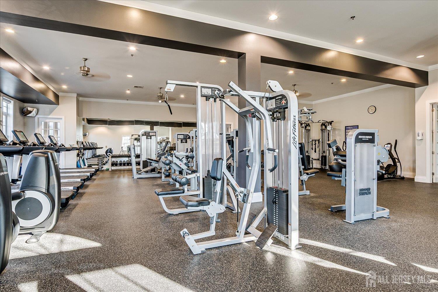 22 Silver Charm Road Manalapan, NJ 07726 - Photo 51 of 51 a view of a room with gym equipment