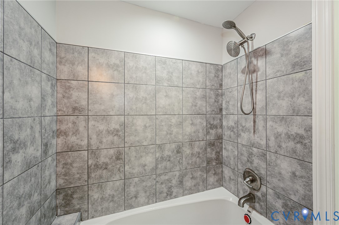 2015 Fordson Road Richmond, VA 23229 - Photo 27 of 48 Bathtub shower combination with gray rectangular w