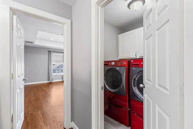 a utility room with dryer and washer