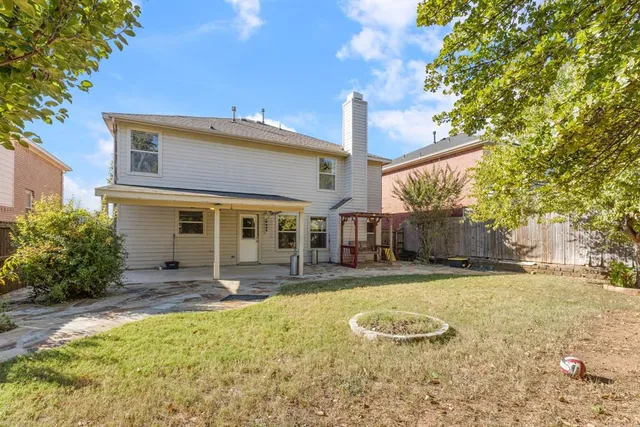 a front view of a house with a yard outdoor seating and yard