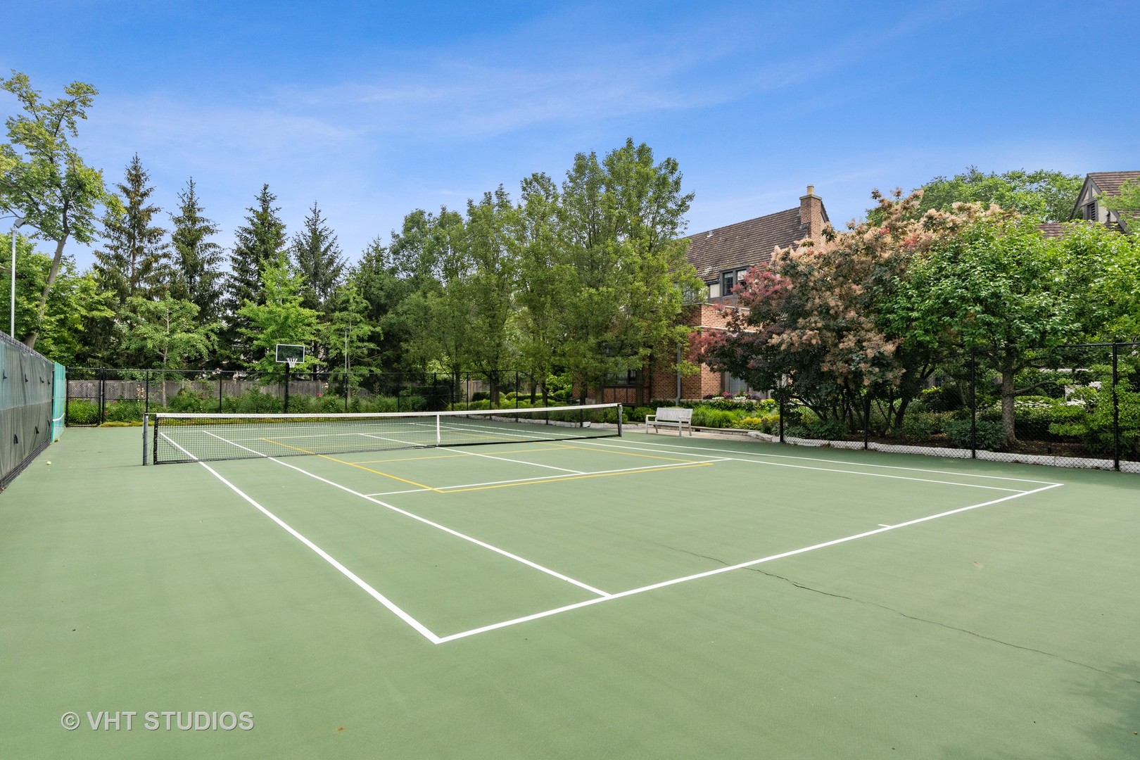 720 Ardsley Road Winnetka, IL 60093 - Photo 22 of 103 a view of a tennis court