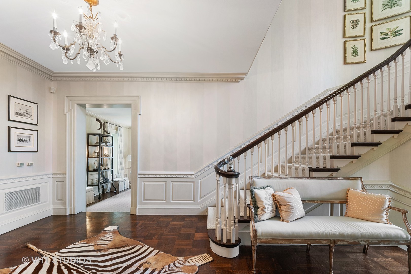 720 Ardsley Road Winnetka, IL 60093 - Photo 30 of 103 a living room with wooden floor and a chandelier