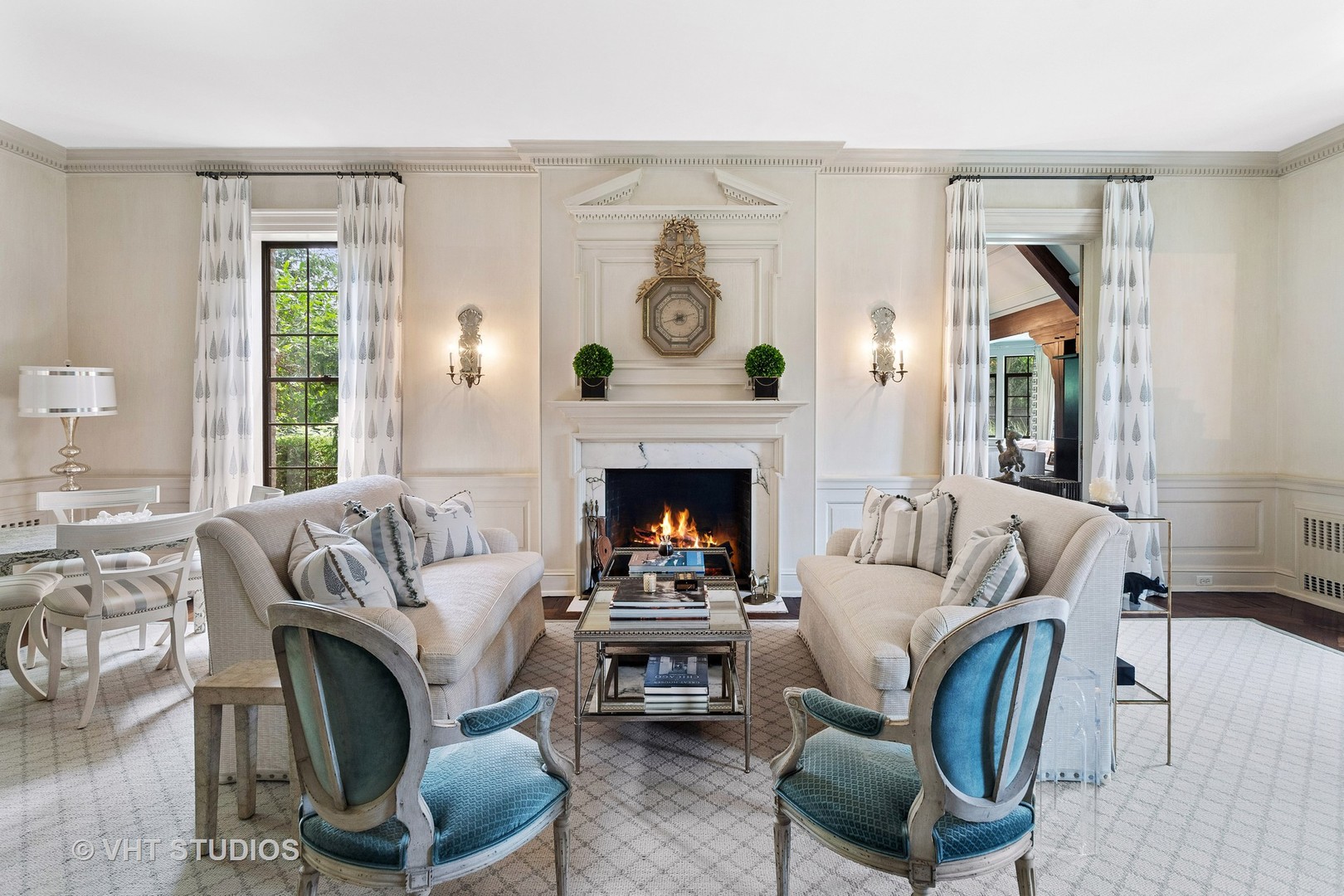 720 Ardsley Road Winnetka, IL 60093 - Photo 41 of 103 a living room with furniture and a fireplace