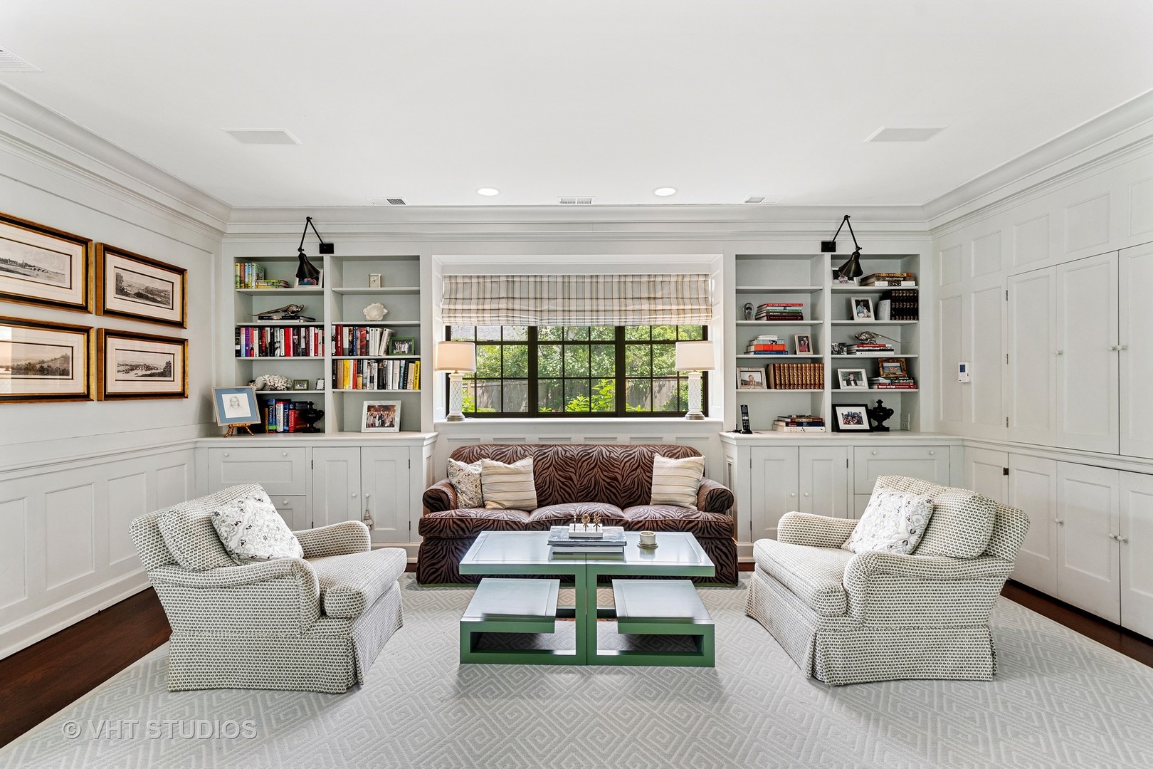 720 Ardsley Road Winnetka, IL 60093 - Photo 54 of 103 a living room with furniture and a large window with bookshelf