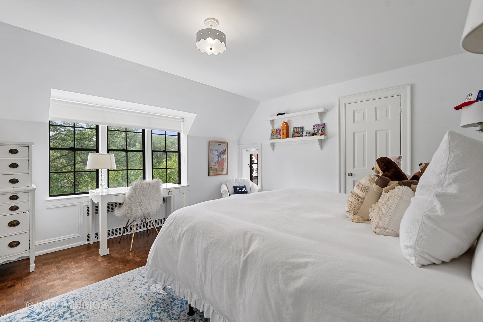 720 Ardsley Road Winnetka, IL 60093 - Photo 67 of 103 a bedroom with a bed and a large window