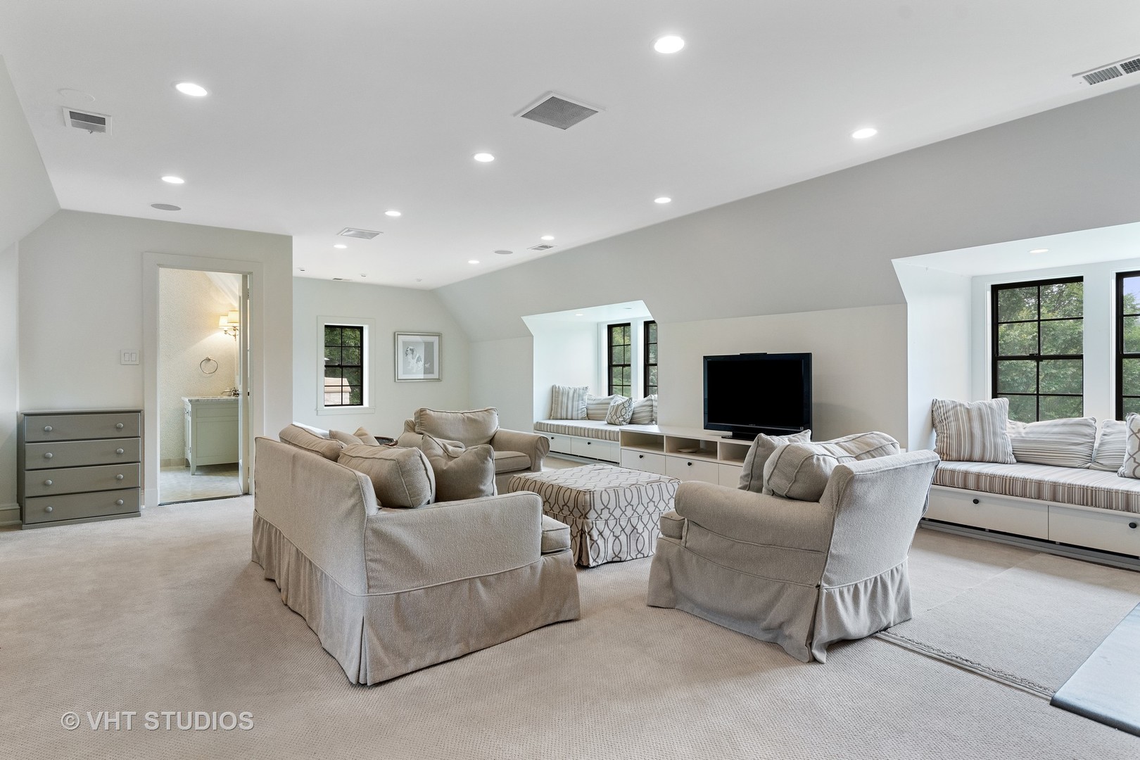 720 Ardsley Road Winnetka, IL 60093 - Photo 76 of 103 a living room with furniture and a flat screen tv