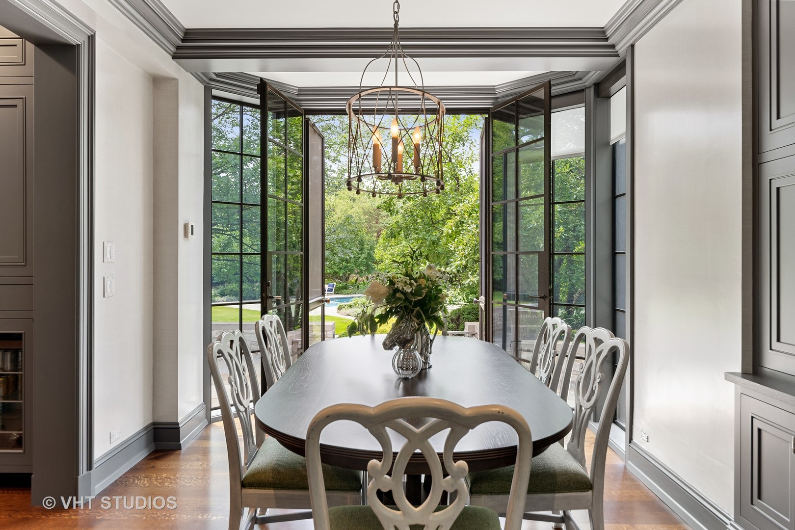 720 Ardsley Road Winnetka, IL 60093 - Photo 88 of 103 a view of a dining room with furniture window and outside view