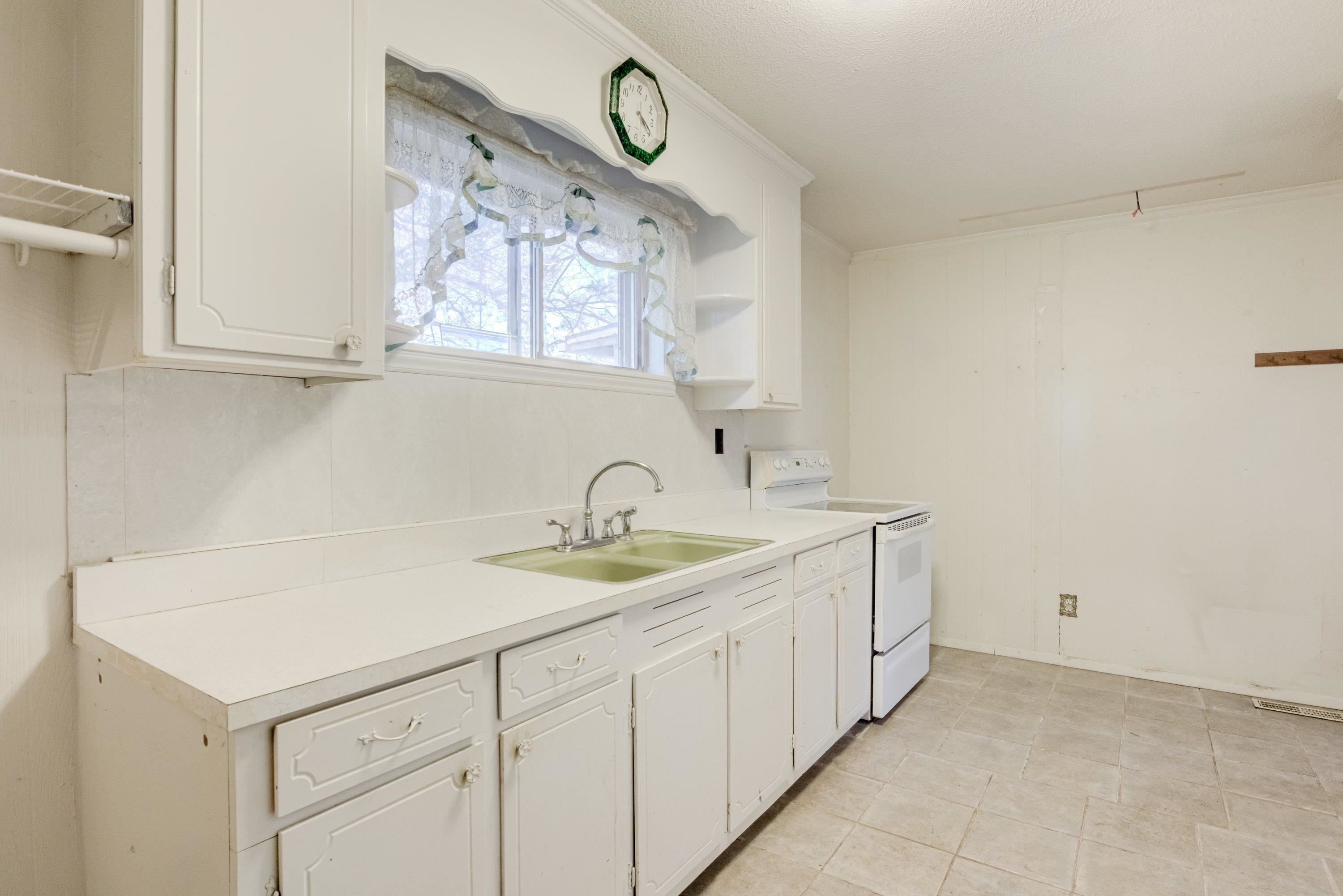 4612 Browns Pond Road Selma, NC 27576 - Photo 15 of 50 a bathroom with a sink and a mirror