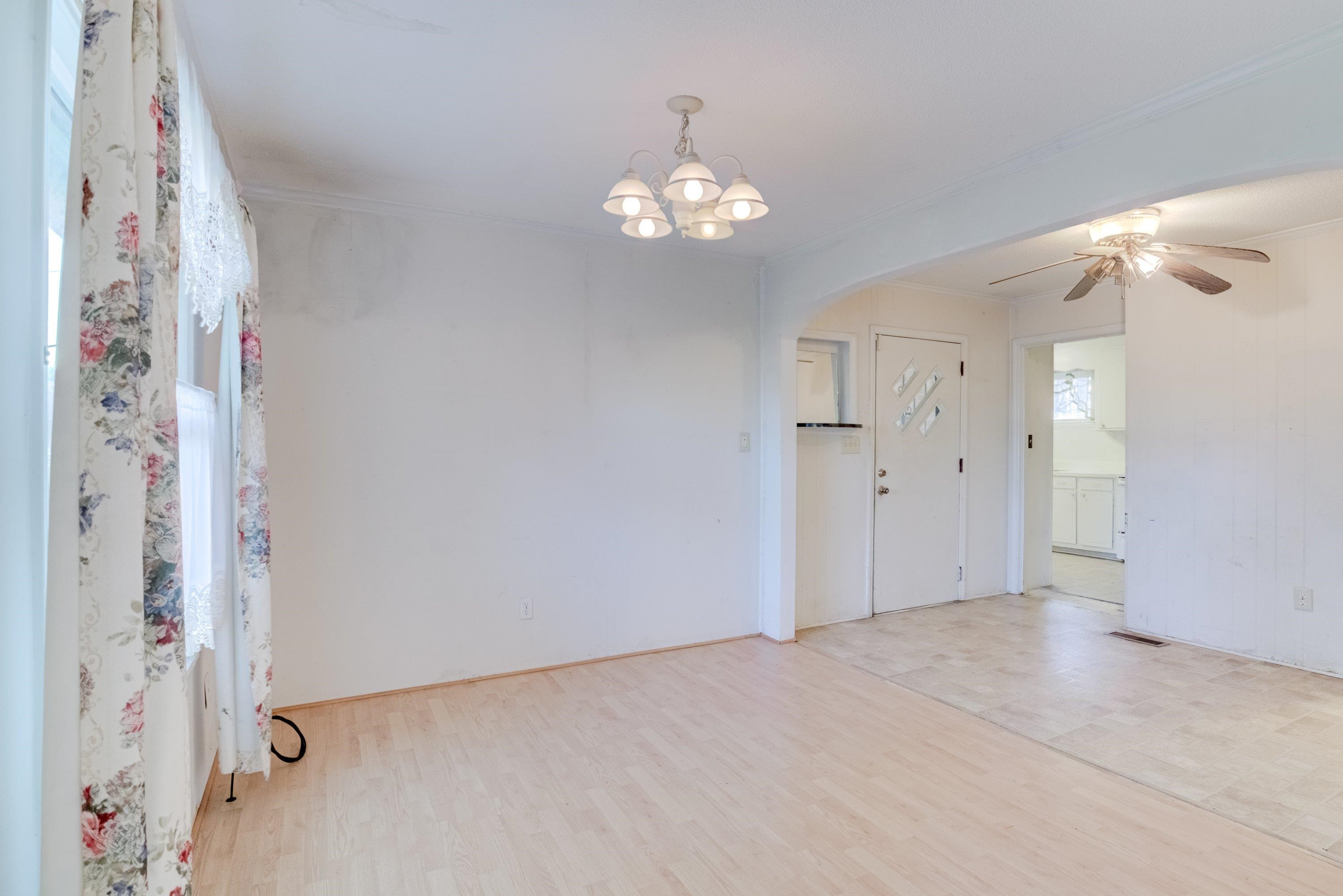 4612 Browns Pond Road Selma, NC 27576 - Photo 18 of 50 a view of an empty room with chandelier fan