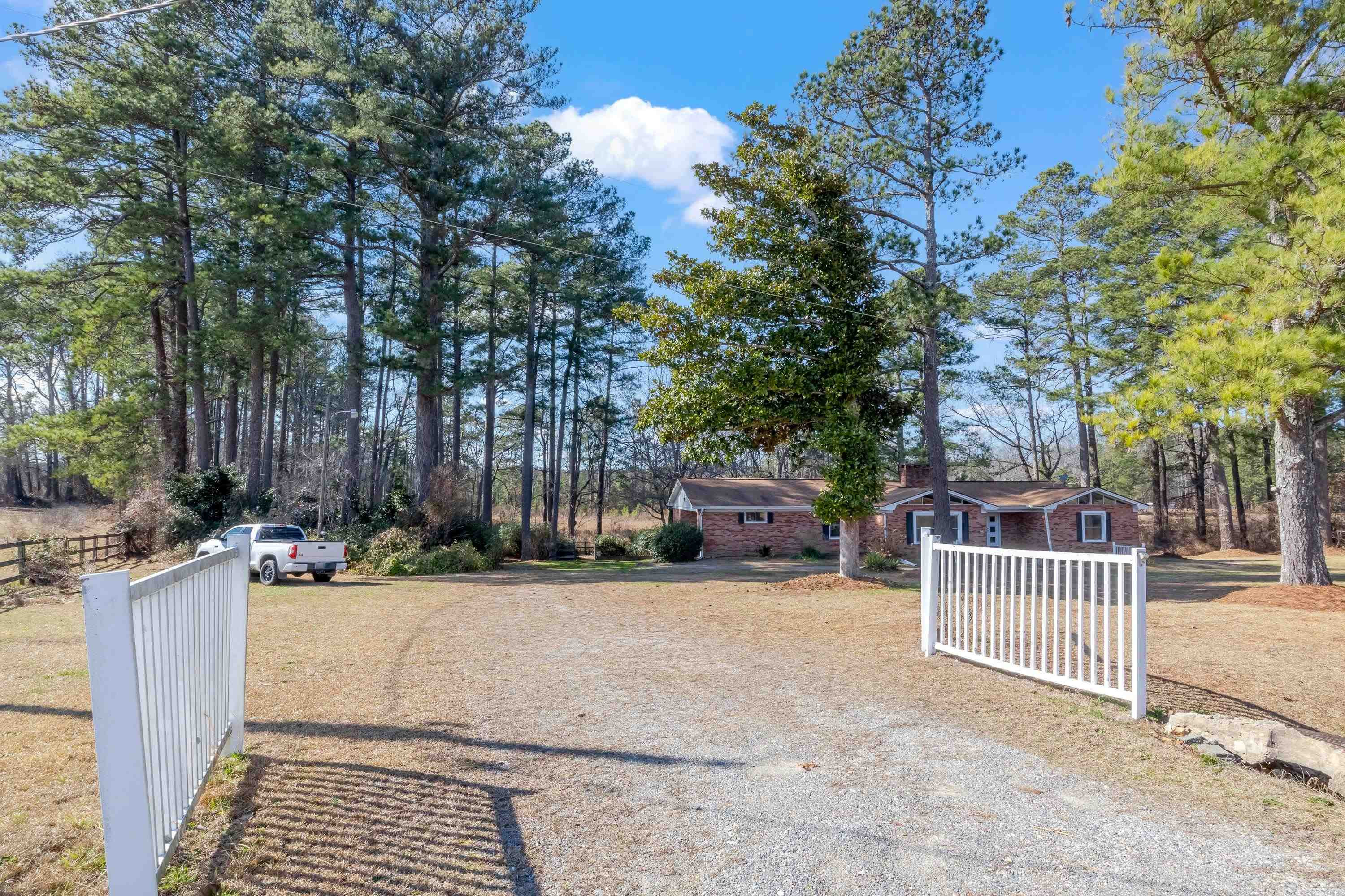 4612 Browns Pond Road Selma, NC 27576 - Photo 2 of 50 a view of a house with a patio