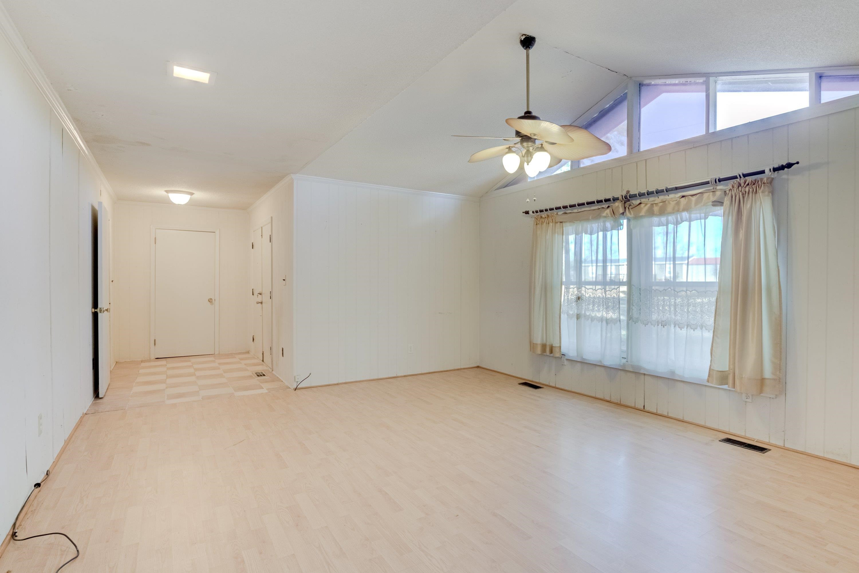 4612 Browns Pond Road Selma, NC 27576 - Photo 23 of 50 a view of an empty room with a window