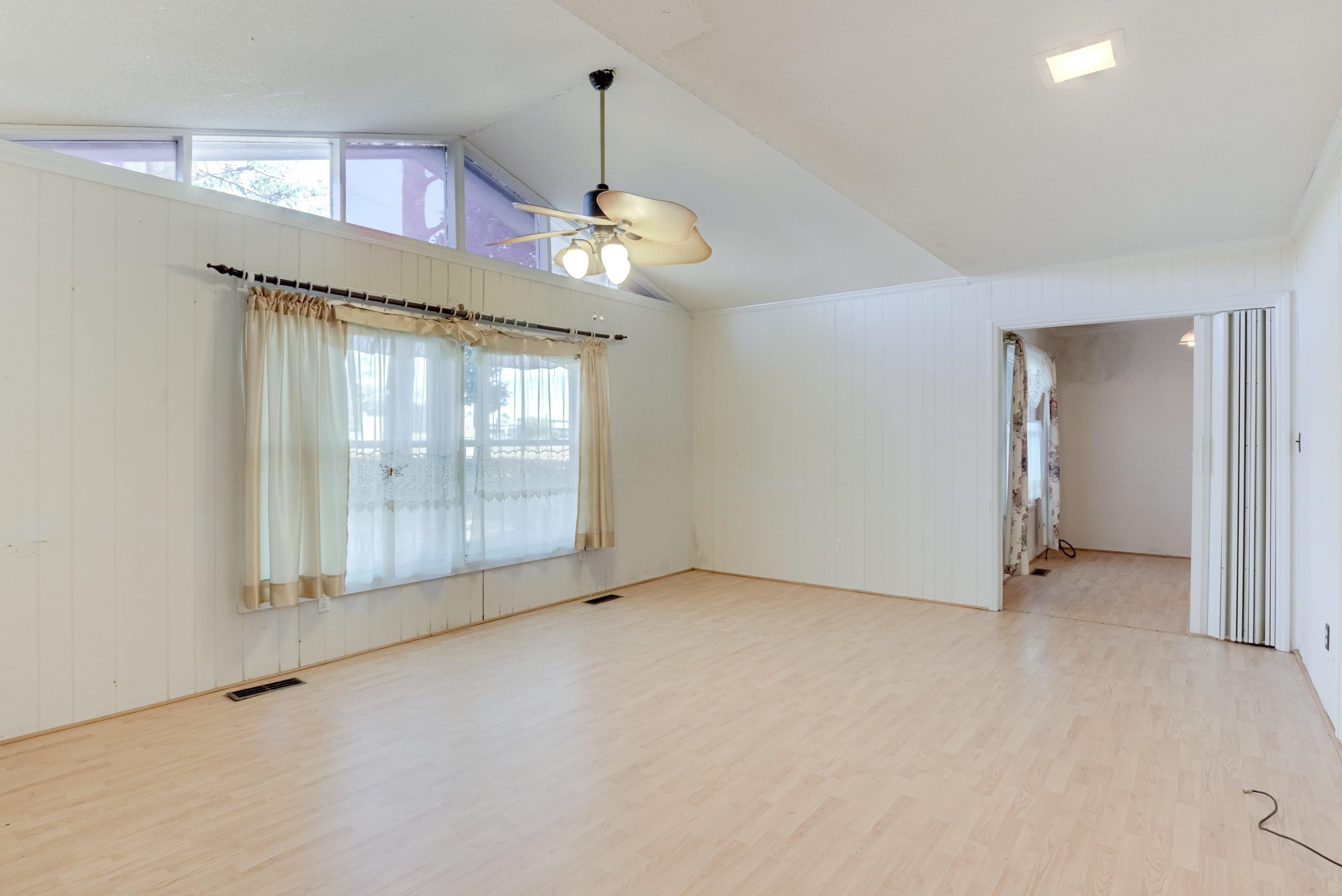 4612 Browns Pond Road Selma, NC 27576 - Photo 24 of 50 a view of an empty room with a window