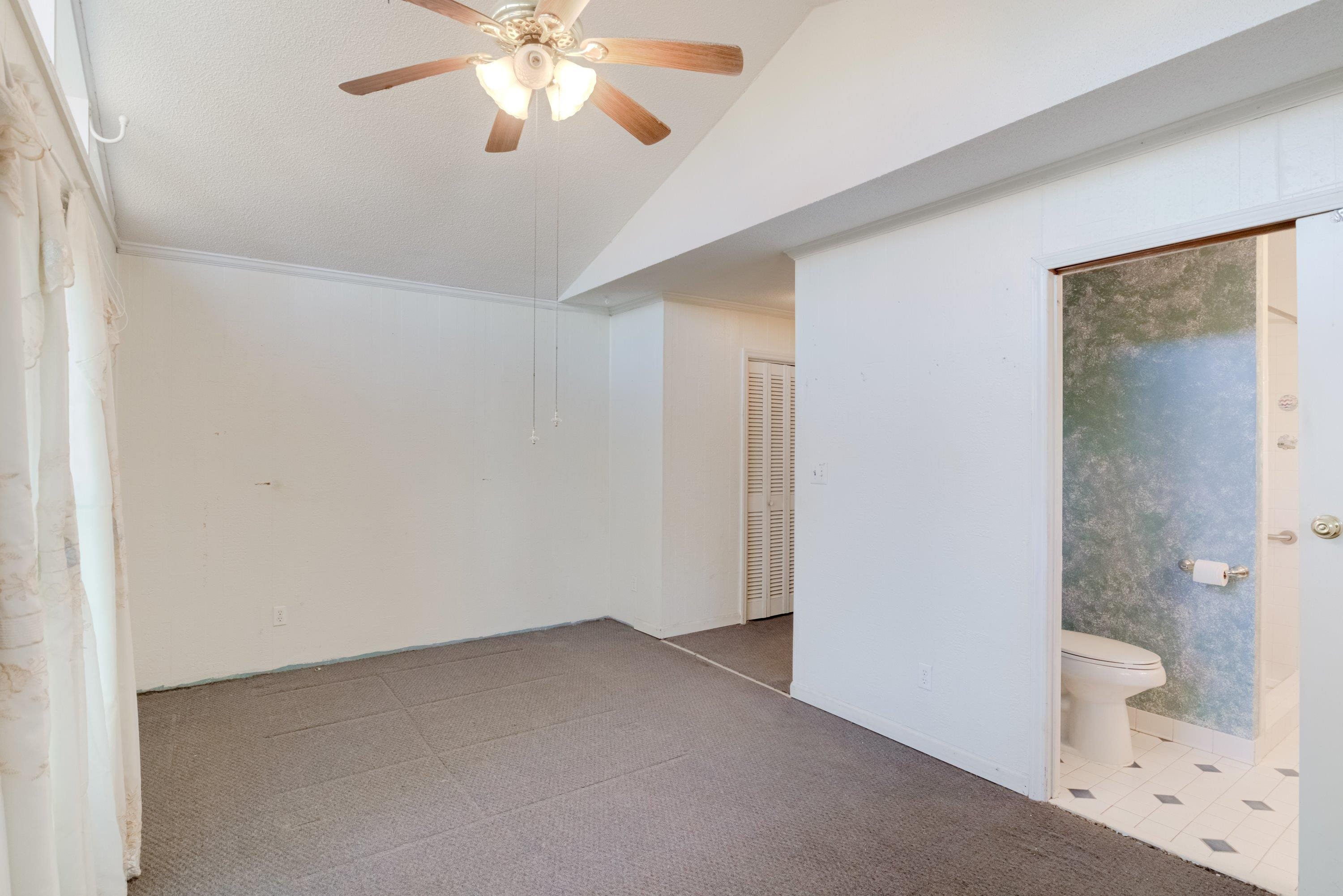 4612 Browns Pond Road Selma, NC 27576 - Photo 27 of 50 a view of an empty room with a window