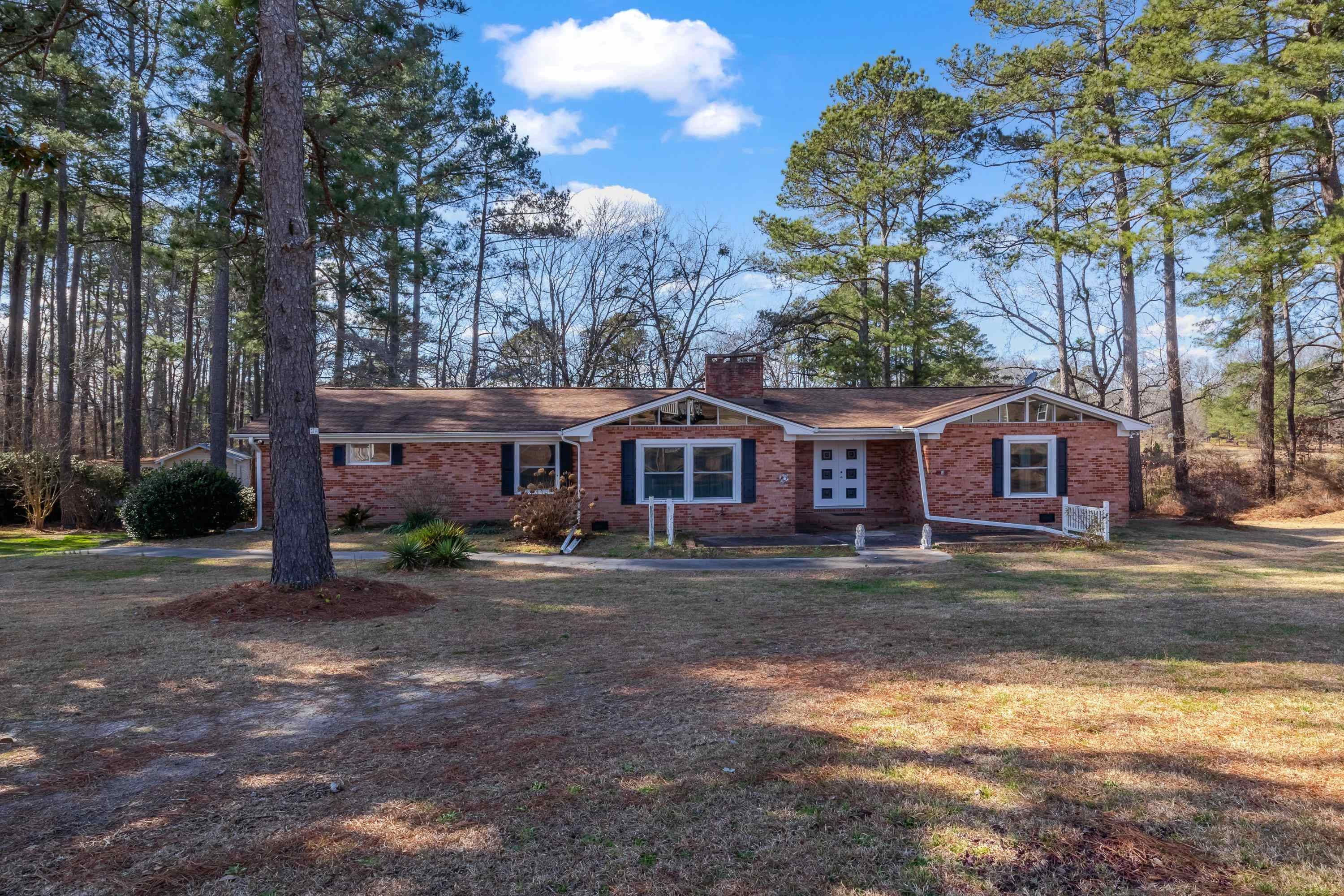 4612 Browns Pond Road Selma, NC 27576 - Photo 3 of 50 a front view of a house with a yard