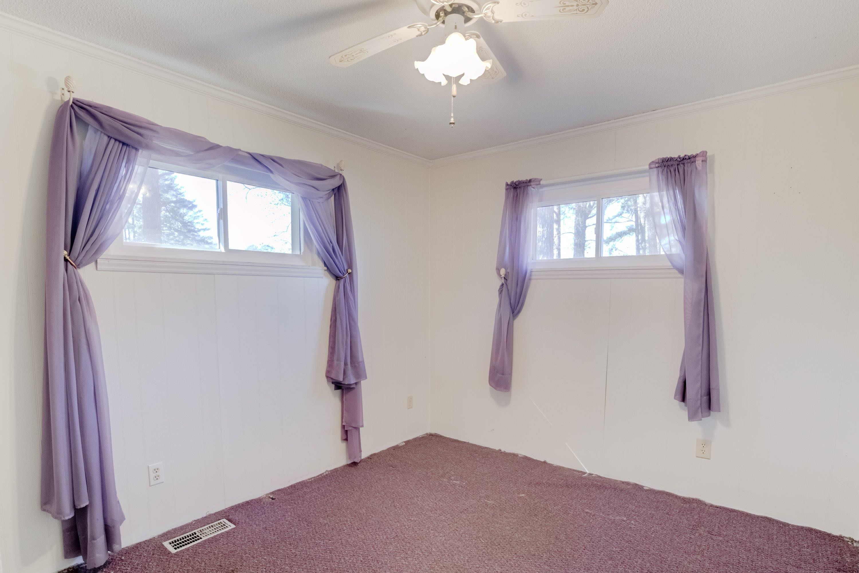 4612 Browns Pond Road Selma, NC 27576 - Photo 31 of 50 wooden floor in an empty room with a window