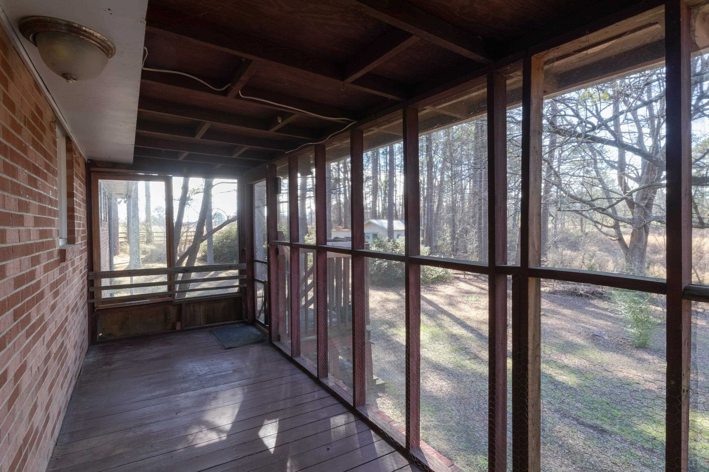 4612 Browns Pond Road Selma, NC 27576 - Photo 39 of 50 a view of an empty room with a window