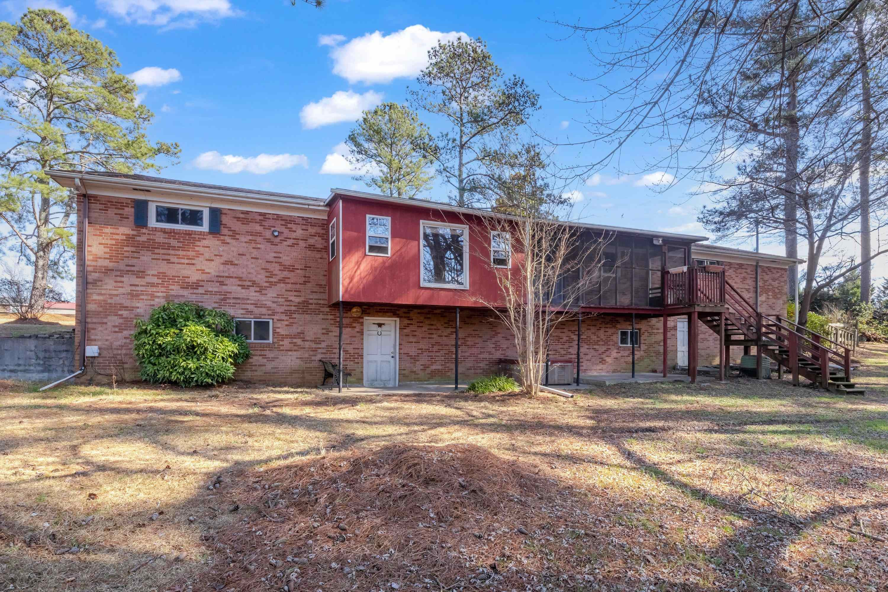 4612 Browns Pond Road Selma, NC 27576 - Photo 44 of 50 a front view of a house with a garden