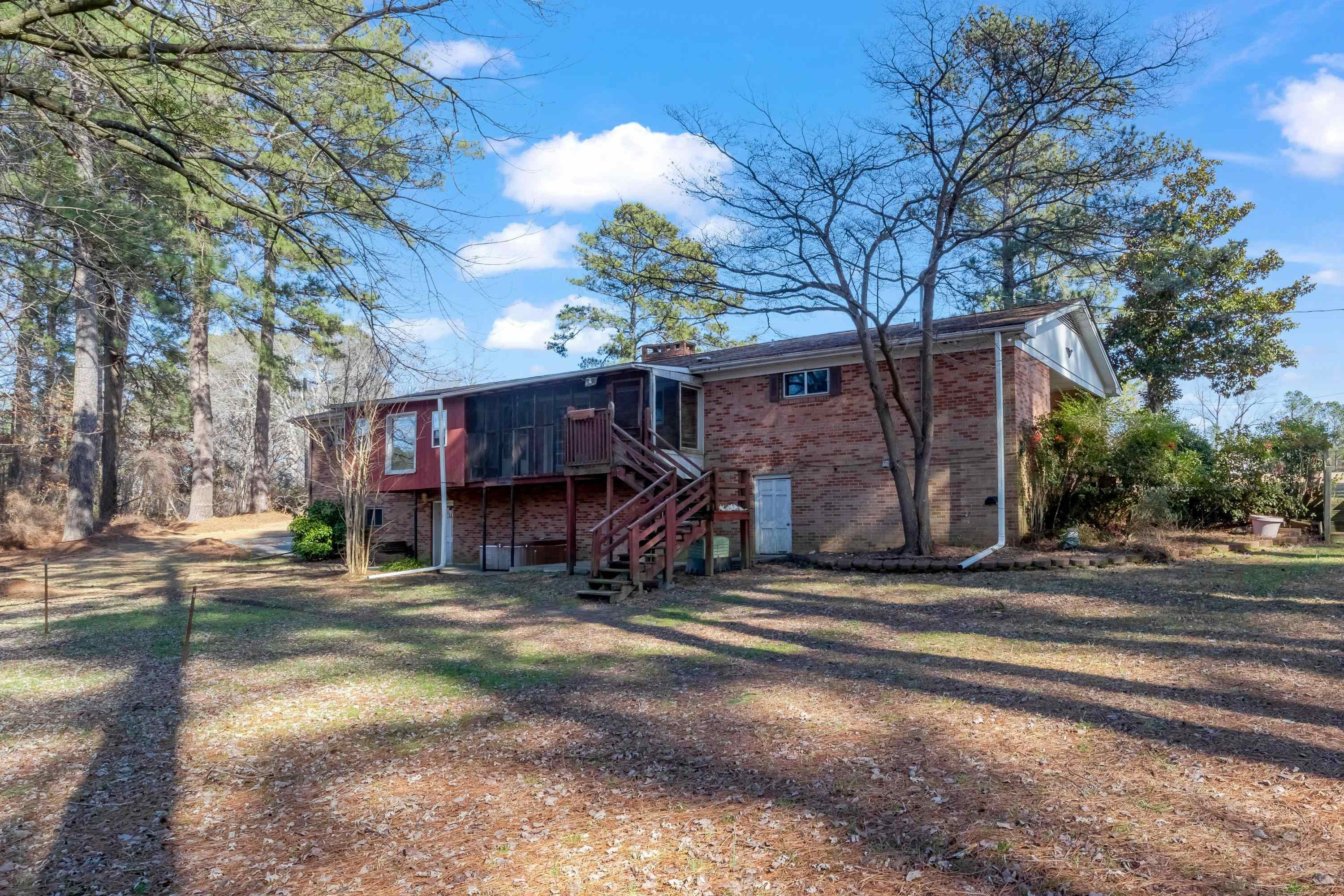 4612 Browns Pond Road Selma, NC 27576 - Photo 47 of 50 a view of a house with a patio